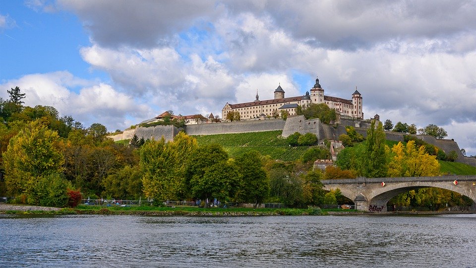 Big castle next to the water.