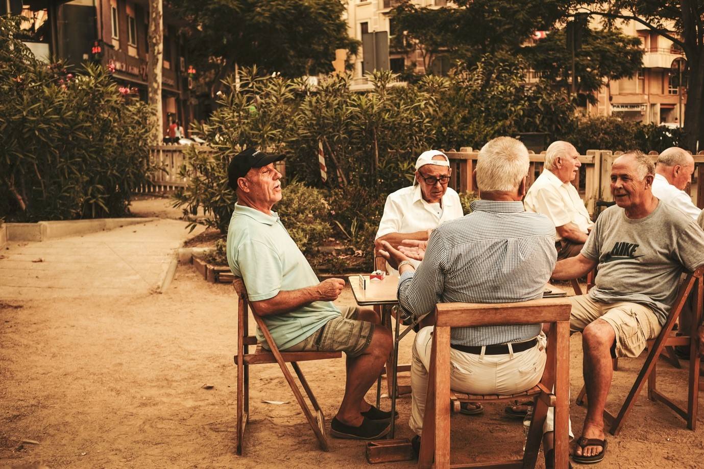 A group of elderly people chatting